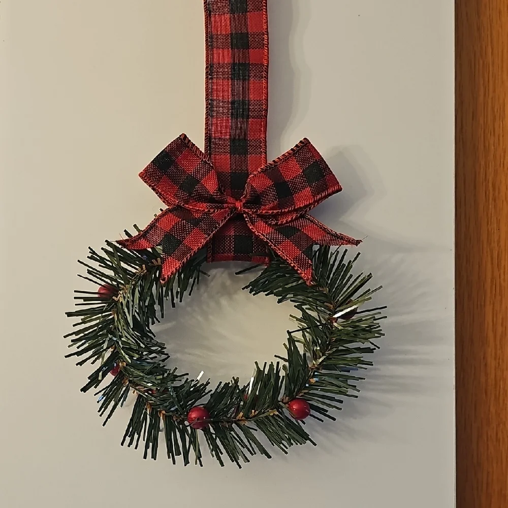 Festive Green Holiday Wreath with Red Bow